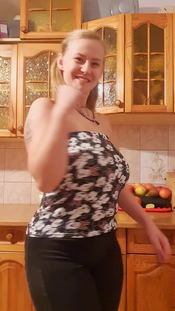 And out from under the Mickey Mouse blouse come two large loaves.... because we're in the kitchen after all