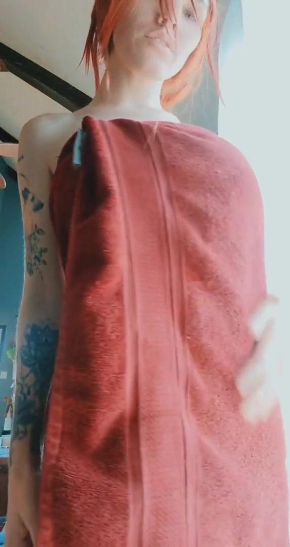 Busty redhead reveal
