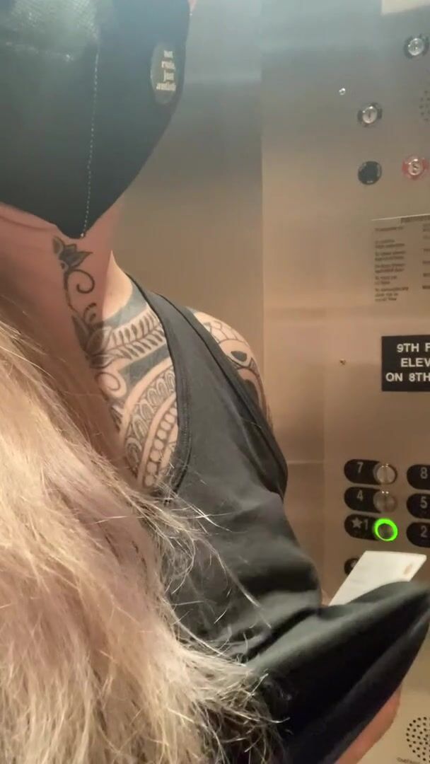 Flashing my boobies in the elevator