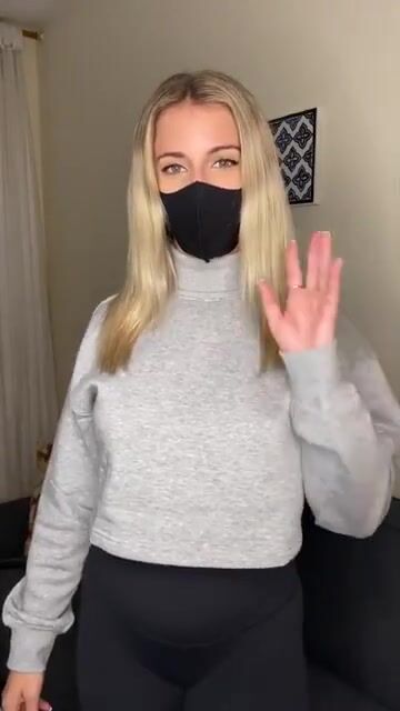 If you were wondering what that cutie on the bus has under her sweater