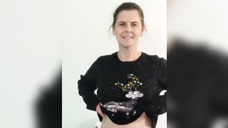 Average mom showing her Christmas sweater puppies